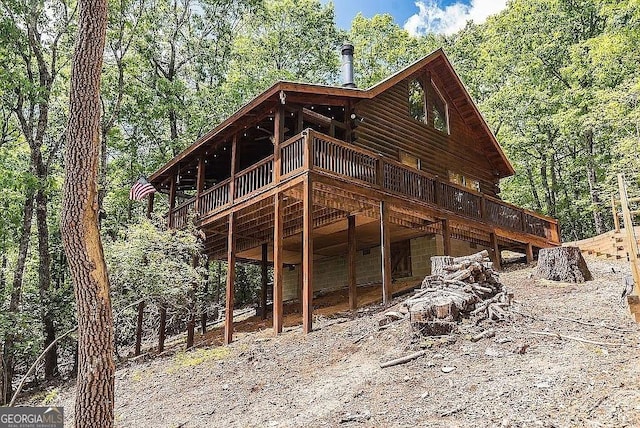 137 Ascherman Ct, Blue Ridge, GA 30513 - view of home's exterior featuring a deck and a view of trees