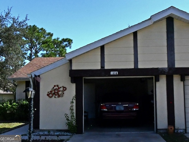 1338 SE La Haven Ct, Port Saint Lucie, FL 34952 - garage featuring concrete driveway