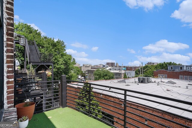 204 Walker St SW Unit 319, Atlanta, GA 30313 - balcony featuring central air condition unit and a city view