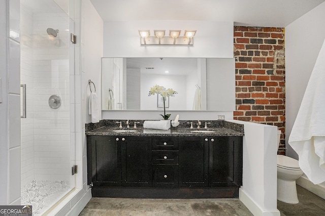 204 Walker St SW Unit 319, Atlanta, GA 30313 - bathroom with a shower stall, double vanity, toilet, and concrete flooring