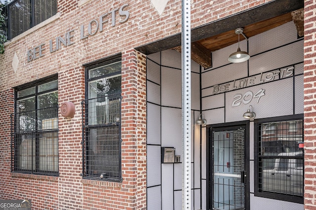 204 Walker St SW Unit 319, Atlanta, GA 30313 - view of exterior entry with brick siding