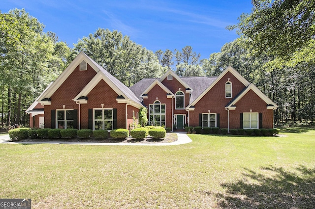 3780 Lovers Ln, Monroe, GA 30656 - traditional-style home featuring brick siding and a front yard