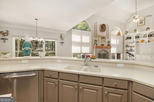 3780 Lovers Ln, Monroe, GA 30656 - kitchen featuring dishwasher, a sink, gray cabinets, a brick fireplace, and light countertops