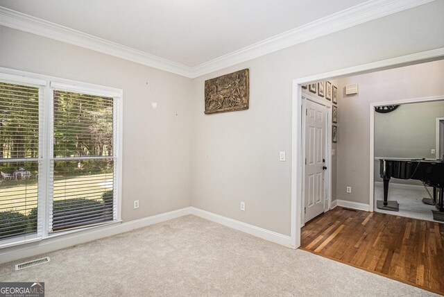 3780 Lovers Ln, Monroe, GA 30656 - carpeted empty room with crown molding and baseboards