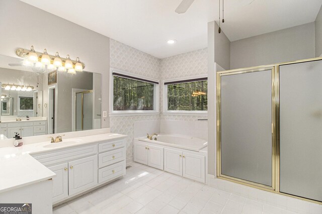 3780 Lovers Ln, Monroe, GA 30656 - bathroom featuring a stall shower, vanity, a garden tub, tile patterned floors, and ceiling fan