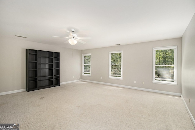 3780 Lovers Ln, Monroe, GA 30656 - unfurnished room with a ceiling fan, healthy amount of natural light, carpet floors, and baseboards