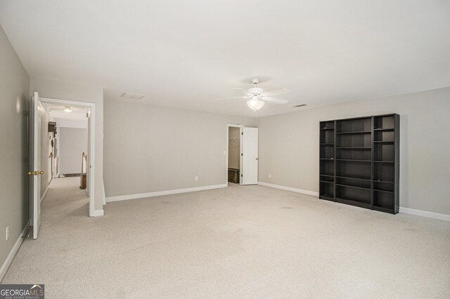 3780 Lovers Ln, Monroe, GA 30656 - unfurnished bedroom featuring carpet flooring, a ceiling fan, and baseboards