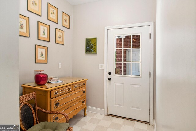 3780 Lovers Ln, Monroe, GA 30656 - doorway featuring light floors, baseboards, and an office area
