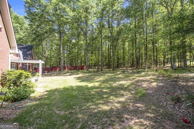 3780 Lovers Ln, Monroe, GA 30656 - view of yard featuring a forest view