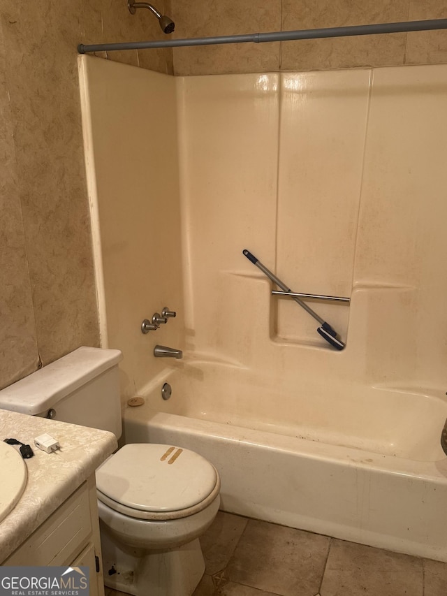 411 Willow Ct SE, Conyers, GA 30094 - full bathroom with toilet, tile patterned flooring, vanity, and shower / bathtub combination