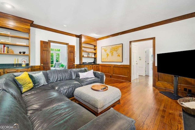 4411 Paces Battle NW, Atlanta, GA 30327 - living area with ornamental molding, wood finished floors, built in features, and a wainscoted wall