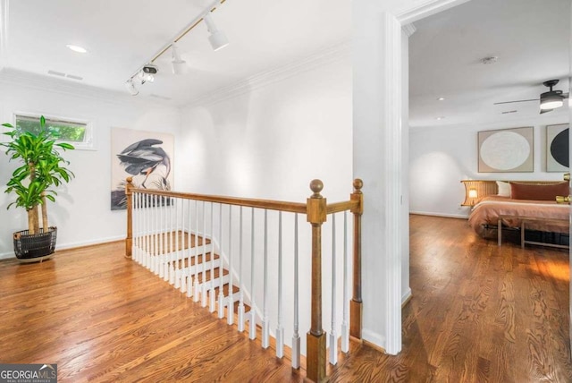 4411 Paces Battle NW, Atlanta, GA 30327 - hall with rail lighting, an upstairs landing, crown molding, and wood finished floors