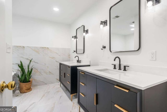 4411 Paces Battle NW, Atlanta, GA 30327 - full bathroom with marble finish flooring, two vanities, and recessed lighting