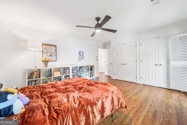4411 Paces Battle NW, Atlanta, GA 30327 - bedroom with wood finished floors, two closets, ornamental molding, and ceiling fan