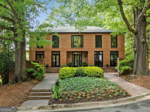 4411 Paces Battle NW, Atlanta, GA 30327 - colonial-style house with french doors and brick siding