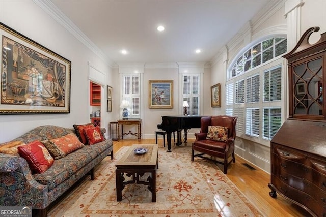 4470 Crestwicke Pointe, Atlanta, GA 30319 - living room with wood finished floors, crown molding, healthy amount of natural light, and recessed lighting