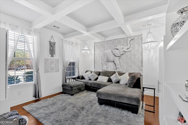 138 Lakestone Pkwy, Woodstock, GA 30188 - living room featuring a chandelier, coffered ceiling, wood finished floors, beam ceiling, and baseboards