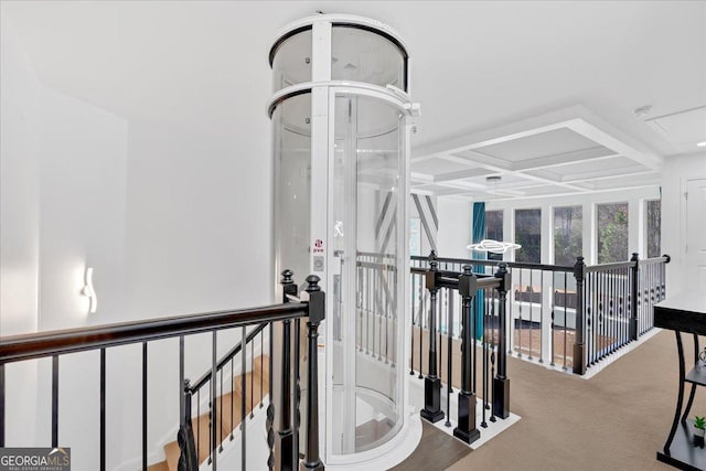 138 Lakestone Pkwy, Woodstock, GA 30188 - corridor featuring an upstairs landing, coffered ceiling, and carpet floors