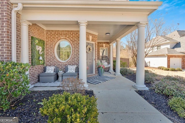 138 Lakestone Pkwy, Woodstock, GA 30188 - property entrance featuring covered porch and brick siding