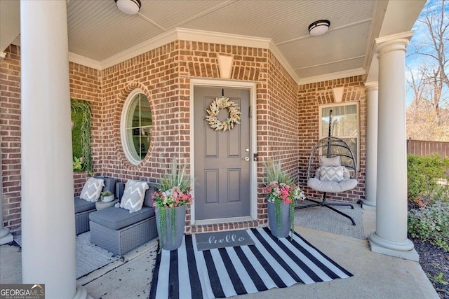 138 Lakestone Pkwy, Woodstock, GA 30188 - doorway to property featuring brick siding and covered porch
