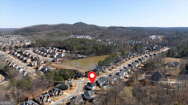 138 Lakestone Pkwy, Woodstock, GA 30188 - aerial view of property and surrounding area featuring a water and mountain view and a heavily wooded area