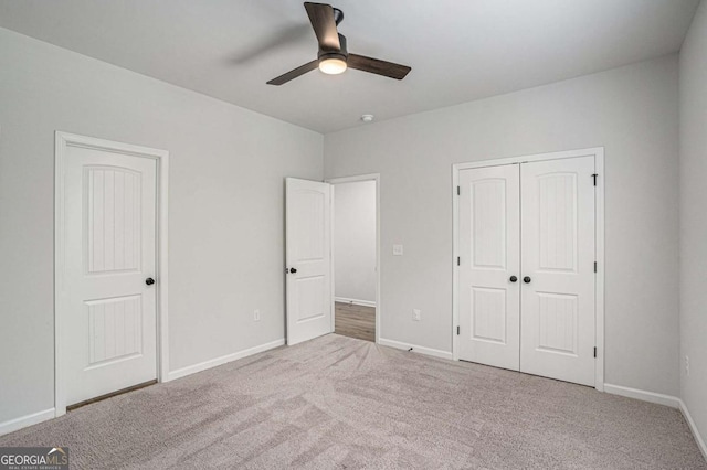 953 Mystic Way, Hampton, GA 30228 - unfurnished bedroom featuring carpet flooring, a closet, and ceiling fan
