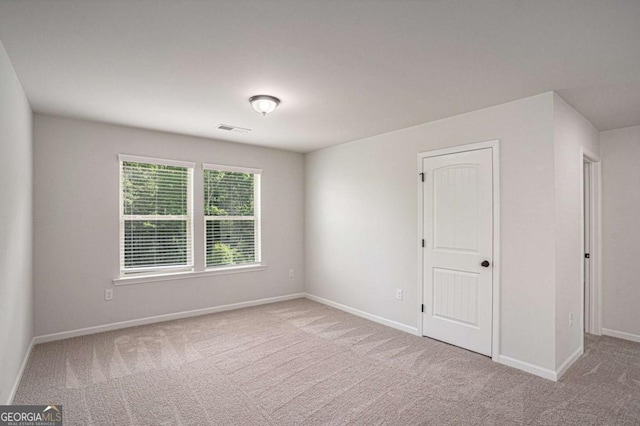 953 Mystic Way, Hampton, GA 30228 - carpeted empty room with baseboards