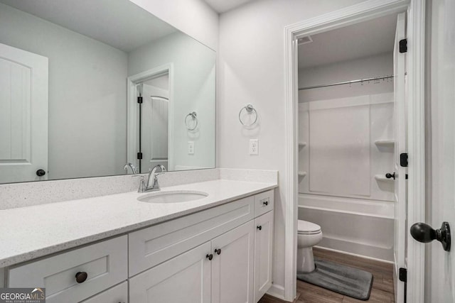 953 Mystic Way, Hampton, GA 30228 - bathroom with vanity, wood finished floors, and  shower combination