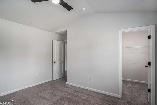 953 Mystic Way, Hampton, GA 30228 - unfurnished bedroom with vaulted ceiling, carpet, a spacious closet, a closet, and ceiling fan