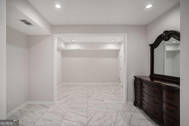 953 Mystic Way, Hampton, GA 30228 - hallway featuring light marble finish flooring and recessed lighting