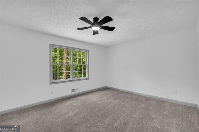 5200 Beechwood Forest Ct, Lithonia, GA 30038 - unfurnished room featuring a textured ceiling, carpet flooring, and a ceiling fan