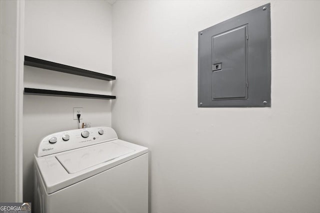 laundry room featuring washer / clothes dryer and electric panel
