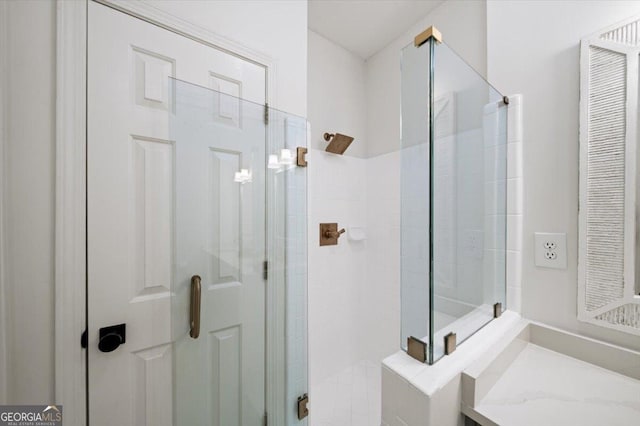 full bath featuring a stall shower