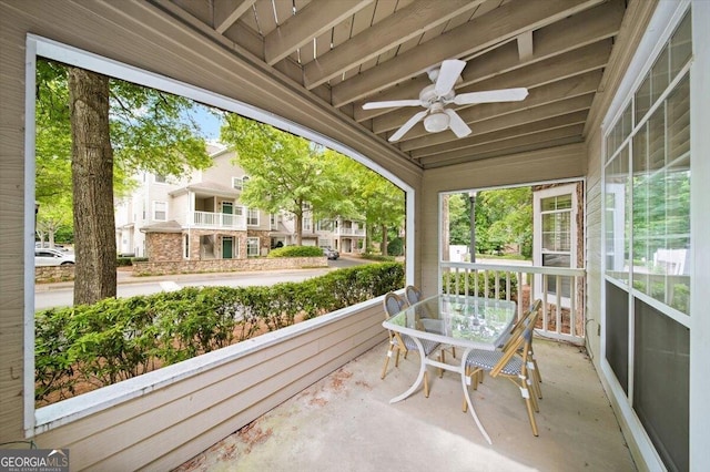 view of patio / terrace with ceiling fan and outdoor dining area