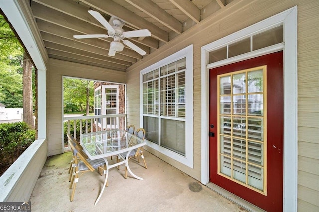 view of patio / terrace with ceiling fan and outdoor dining space