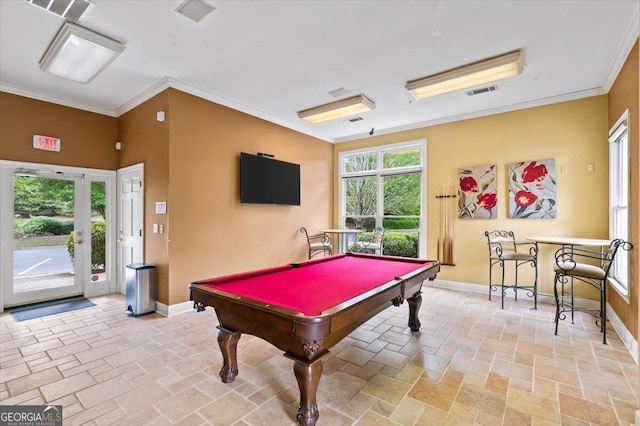 playroom featuring baseboards, billiards table, stone tile flooring, and ornamental molding