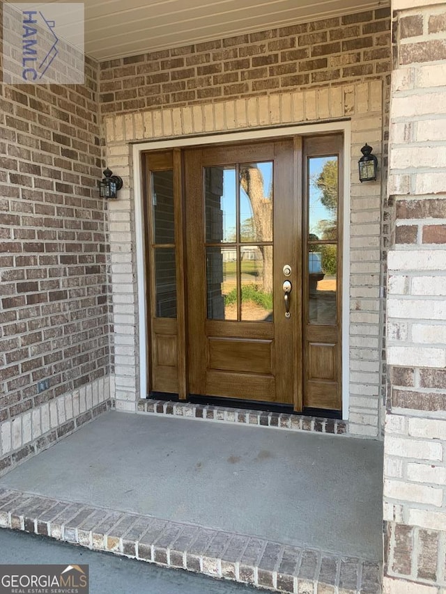 103 Abbie Ln, Glennville, GA 30427 - property entrance with brick siding