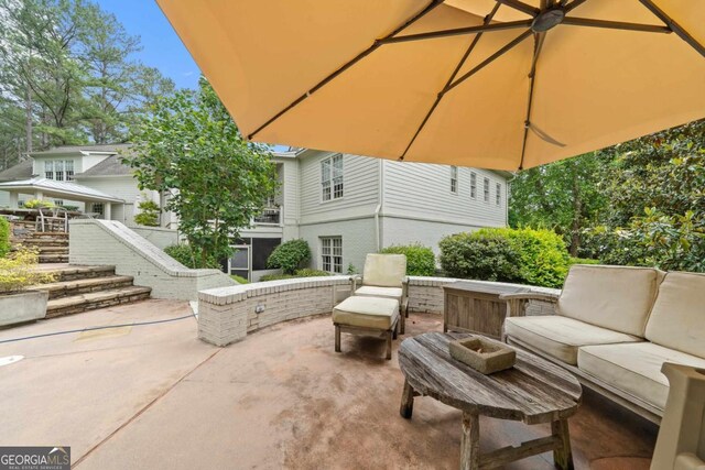 143 Wildwood Dr, Eatonton, GA 31024 - view of patio featuring outdoor lounge area