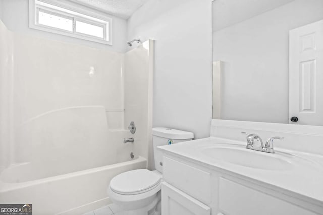 bathroom featuring toilet, a textured ceiling, vanity, shower / tub combination, and tile patterned floors