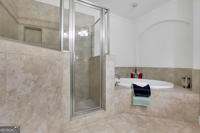 bathroom with crown molding, a stall shower, and a bath