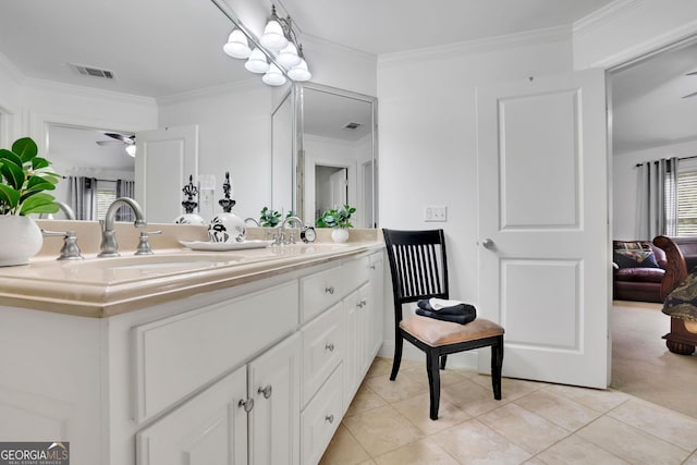 full bath with tile patterned floors, double vanity, ornamental molding, and a ceiling fan