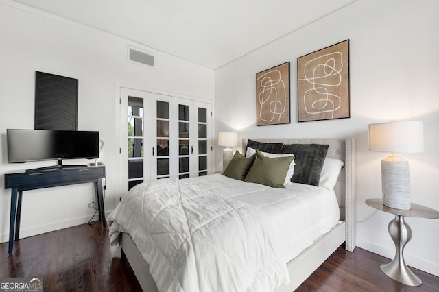 130 26th St NW Unit 801, Atlanta, GA 30309 - bedroom featuring wood finished floors and baseboards