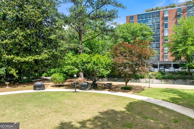 130 26th St NW Unit 801, Atlanta, GA 30309 - view of home's community with a lawn