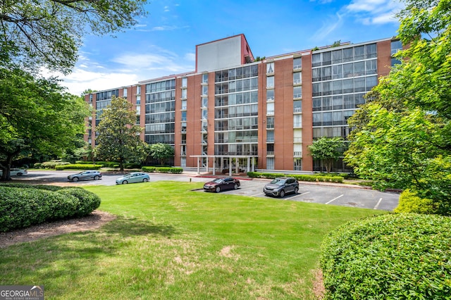 130 26th St NW Unit 801, Atlanta, GA 30309 - view of apartment building / complex with uncovered parking