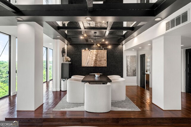 130 26th St NW Unit 801, Atlanta, GA 30309 - dining area featuring coffered ceiling, wood finished floors, beam ceiling, recessed lighting, and baseboards