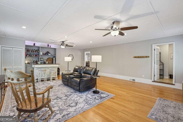 1280 Sherry Dr, Alpharetta, GA 30009 - living area featuring ceiling fan, wood finished floors, a bar, baseboards, and recessed lighting