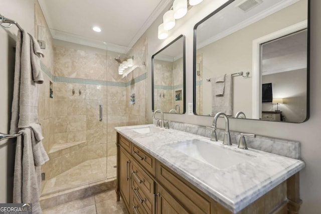 1280 Sherry Dr, Alpharetta, GA 30009 - full bathroom featuring double vanity, a stall shower, crown molding, tile patterned flooring, and recessed lighting