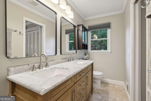 1280 Sherry Dr, Alpharetta, GA 30009 - bathroom featuring double vanity, toilet, ornamental molding, and baseboards