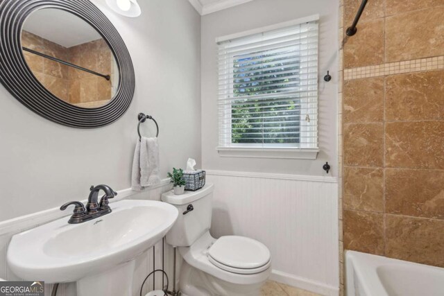 1280 Sherry Dr, Alpharetta, GA 30009 - full bath with wainscoting, toilet, shower / bath combination, a sink, and ornamental molding