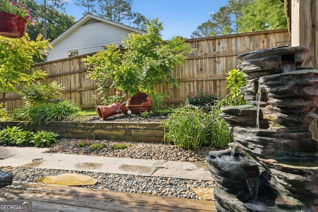 view of yard with fence